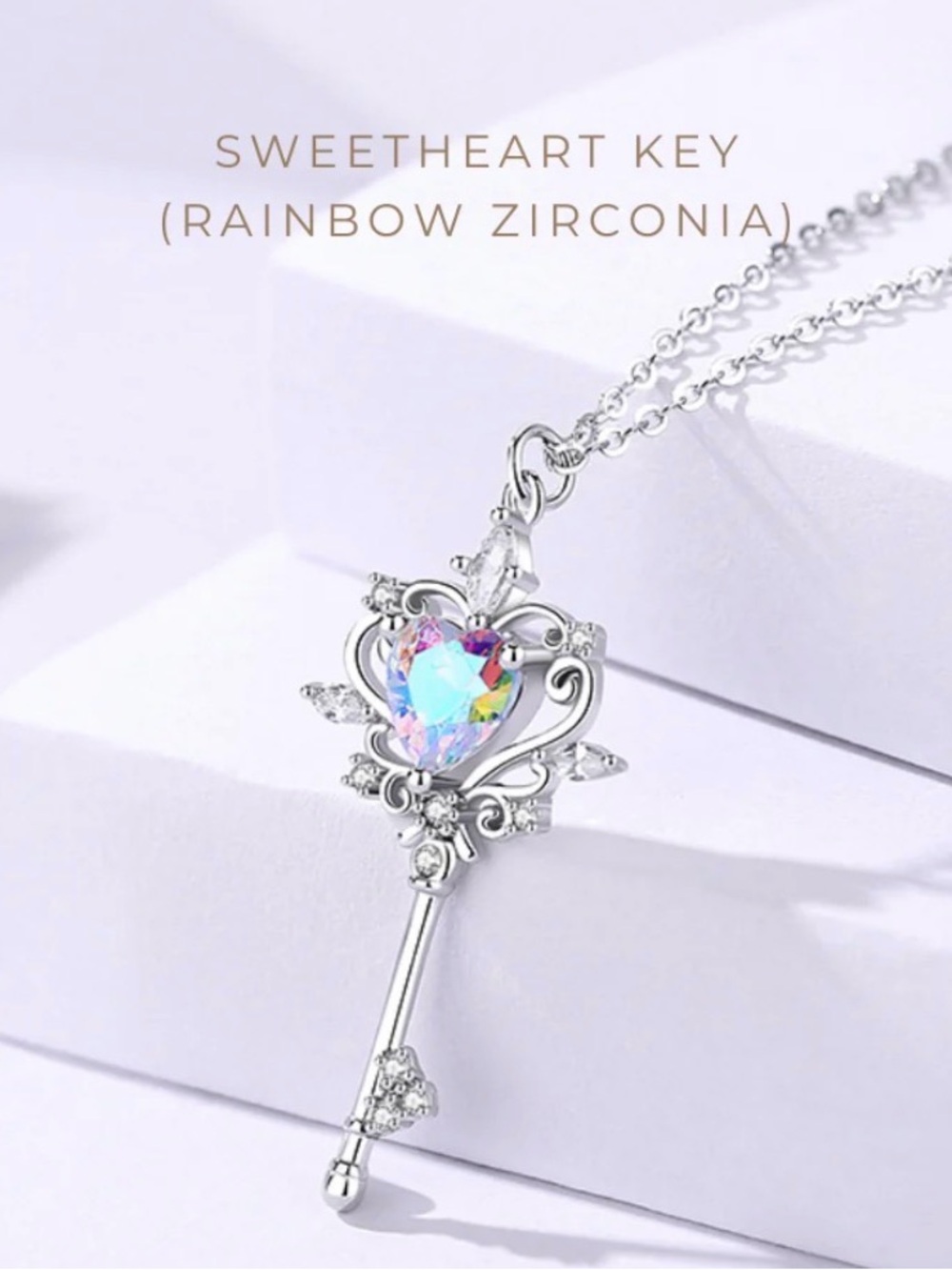 White Gold Plated Key Rainbow Zirconia Necklace. New.